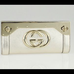 Gucci Gold leather starlight frame clutch